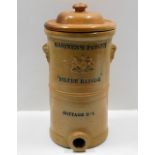 An antique stoneware water filter 16.125in tall