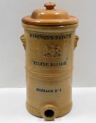An antique stoneware water filter 16.125in tall