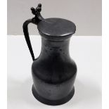 A c.1810 French pewter wine jug with fleur de lys