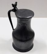 A c.1810 French pewter wine jug with fleur de lys