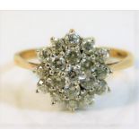 A 9ct gold cluster ring set with CZ stones 2.9g si