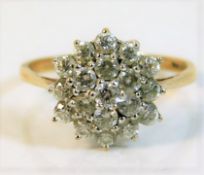 A 9ct gold cluster ring set with CZ stones 2.9g si