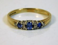 A 9ct gold diamond & sapphire ring 2.5g size R