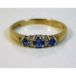 A 9ct gold diamond & sapphire ring 2.5g size R