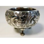 An embossed footed silver salt, Birmingham 1911 23