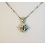 A platinum 16in necklace & diamond pendant of appr