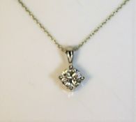 A platinum 16in necklace & diamond pendant of appr