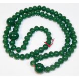 A jade necklace 220g 34in long