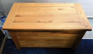 A modern solid oak blanket box 36in wide x 19in de