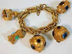 An 18ct gold bracelet with its five original bejew