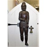 An antique carved oak figure of 15thC. crusader, l