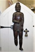 An antique carved oak figure of 15thC. crusader, l