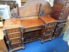 A Victorian mahogany dressing table, mirror a/f, twinned with two similar cupboards, both a/f