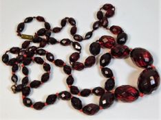 Two faceted amber style beaded necklaces 57.2g 20i
