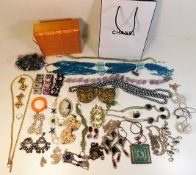 A quantity of costume jewellery including two bras