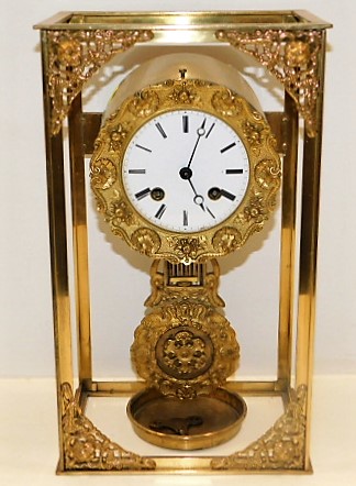 A 19thC. brass French Empire Clock 14.5in high. Pr