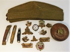 A Royal Engineers military cap, three pocket knive