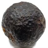 An early iron cannon ball 5in diameter