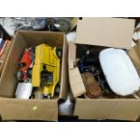 A box of oversized model cars twinned with a box o