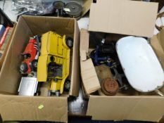 A box of oversized model cars twinned with a box o