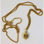 A 20in 9ct gold chain with coffee bean pendant 4.1