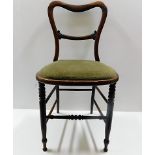 A mid 19thC. rosewood childs chair. Provenance: Fr