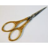 A small pair of antique French scissors with steel