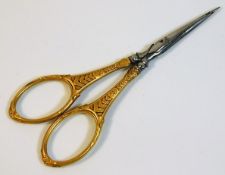A small pair of antique French scissors with steel