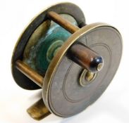 An Allcocks brass fishing reel 2.735in wide