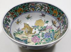A c.1900 Chinese porcelain bowl featuring cat, bir