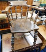 A c.1840 elm smokers bow chair. Provenance: From G