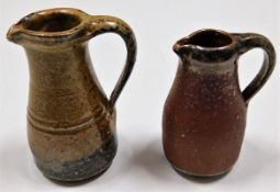 Two miniature St. Ives Leach studio pottery jugs i