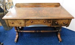 A mid 19thC. walnut library style table with three