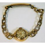 A ladies small 9ct gold cased watch
