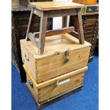 Two robust storage trunks twinned with a rustic mi