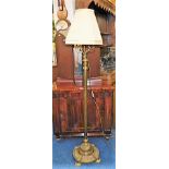 A Victorian brass rise & fall lamp later converted