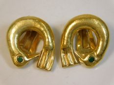 A pair of 18ct Peruvian gold clip on bird shaped e