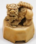 A 19thC. Chinese ivory wax stamp seal featuring fo