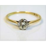 An 18ct gold solitaire ring set with approx. 0.55c