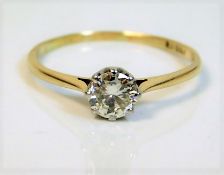 An 18ct gold solitaire ring set with approx. 0.55c