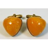 A pair of Russian marked amber cufflinks, some abr