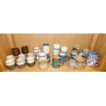 A quantity of studio pottery mugs
