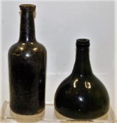 An early wine bottle twinned with a later c.1900 W