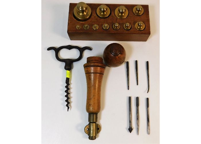 A antique walnut handled treen tool, an antique co