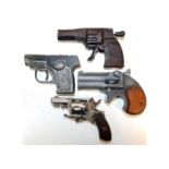 A Spitfire Junior toy gun & other similar pistols.
