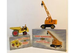 A boxed Dinky 962 diecast toy dumper truck twinned