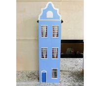 A large Dutch style dolls house 45in high x 14in w