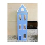 A large Dutch style dolls house 45in high x 14in w