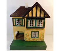 A vintage Triang dolls house approx. 17in tall x 1