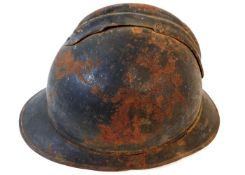 A WW2 french steel helmet. Provenance: Submitted b